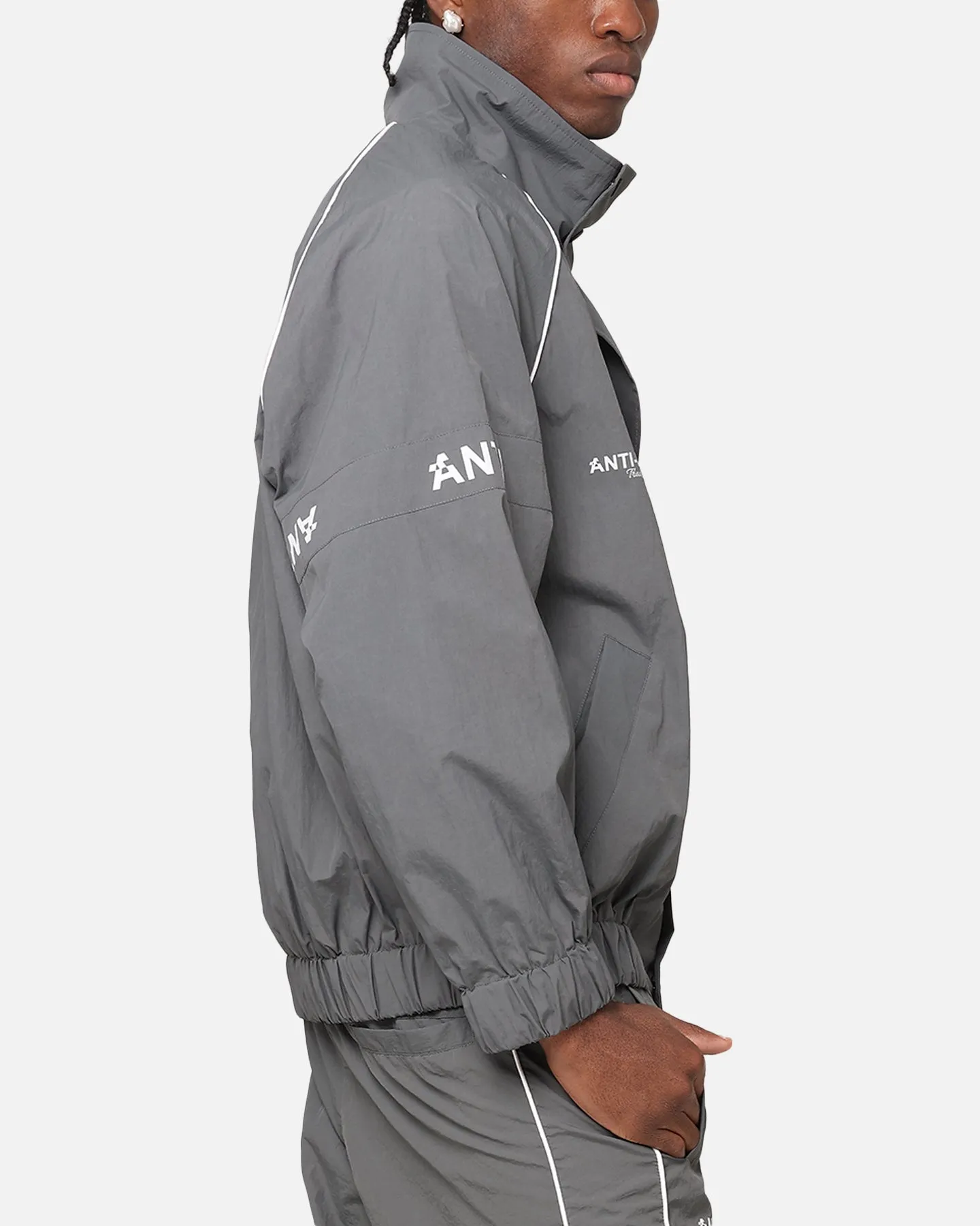 The Anti Order Track Club Windbreaker Jacket Dark Grey/Grey